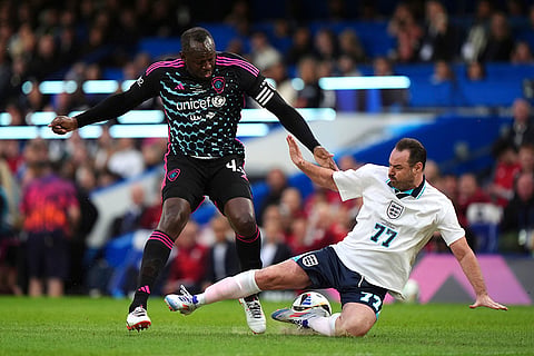 Usain Bolt is challenged by Danny Dyer
